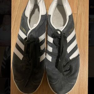 Adidas shoes child size but fits women 8.5